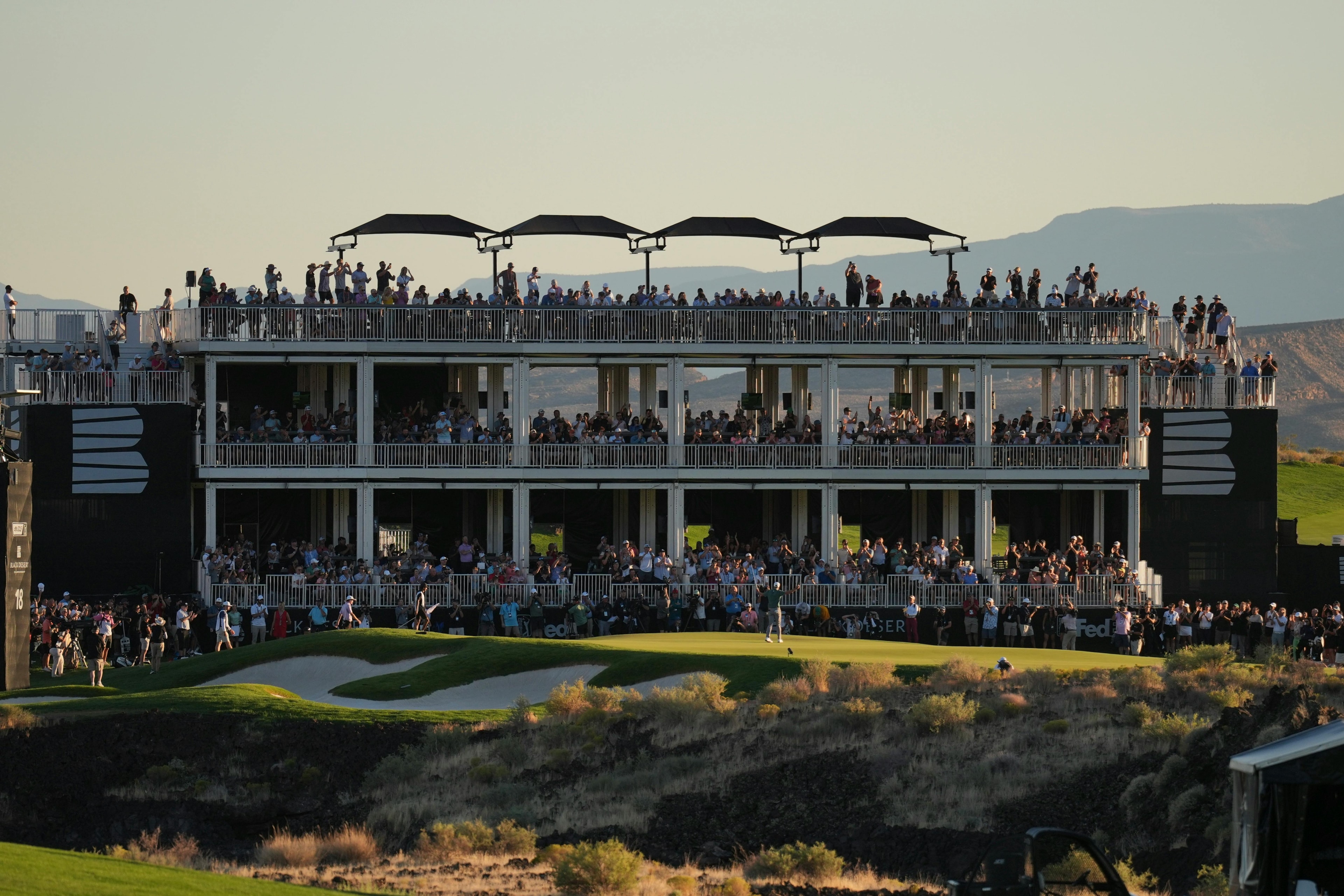 Golf spectators at the big moment.